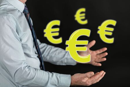 Euro concept above the hands of a manの写真素材