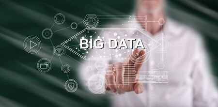 Man touching a big data concept on a touch screen with his finger