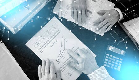 Businesspeople discussing on economic growth; light effect