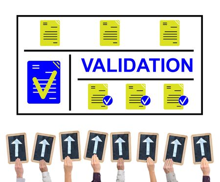 Hands holding writing slates with arrows pointing on validation conceptの写真素材