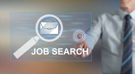 Man touching a job search concept on a touch screen with his fingerの写真素材