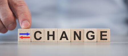Concept of change on wooden cubesの写真素材