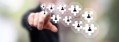 Man touching a team concept on a touch screen with his finger