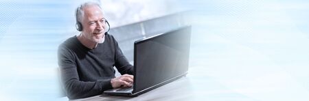 Support phone male operator in headset; panoramic banner