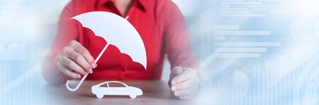 General agent protecting a car; panoramic bannerの写真素材