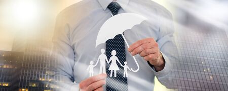 Symbol of family protection by a general agent; multiple exposureの写真素材