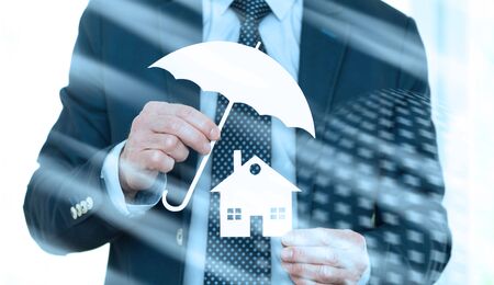 Symbol of home coverage by a general agent; light effectの写真素材