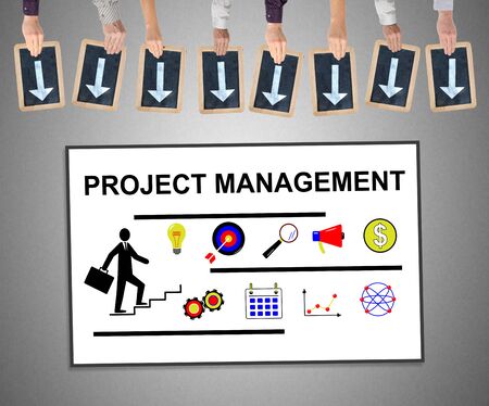 Hands holding writing slates with arrows pointing on project management conceptの写真素材