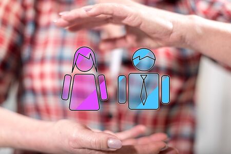 Gender equality concept between hands of a woman in backgroundの写真素材