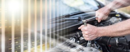 Hands of car mechanic repairing a car engine; multiple exposure