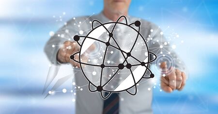 Man touching a global network concept on a touch screen with his fingersの写真素材