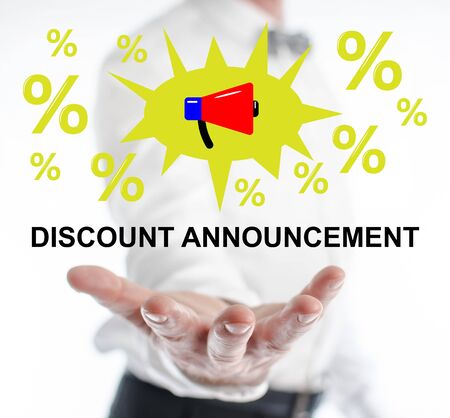 Discount announcement concept levitating above a hand of a manの写真素材