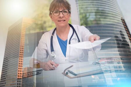 Portrait of female doctor giving a prescription; multiple exposure