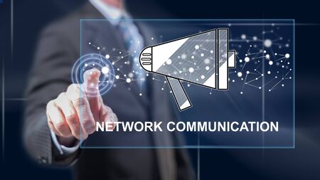 Man touching a network communication concept on a touch screen with his fingersの写真素材