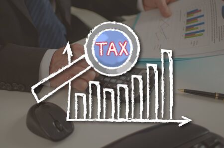 Tax analysis concept illustrated by a picture on backgroundの写真素材
