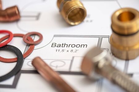 Plumbing equipment on a blueprint