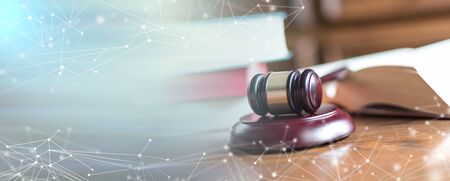 Judge gavel with law books; panoramic banner