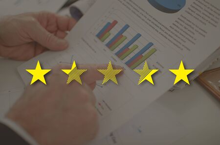 Rating concept illustrated by a picture on backgroundの写真素材