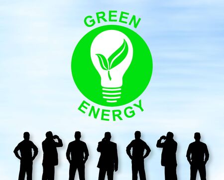 Silhouettes of men looking at a green energy conceptの写真素材