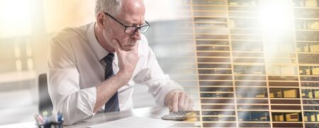 Businessman doing his accounting with calculator; multiple exposure