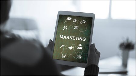 Tablet screen displaying a marketing strategy concept