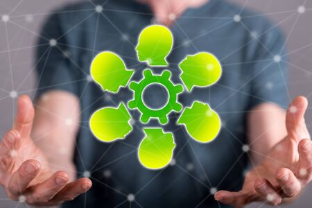 Brainstorming concept between hands of a man in backgroundの写真素材