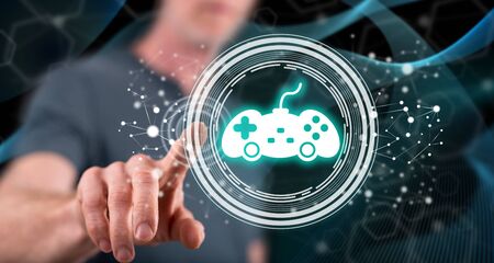 Man touching an online gaming concept on a touch screen with his finger