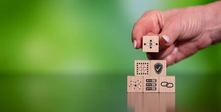 Concept of blockchain technology with icons on wooden cubesの写真素材