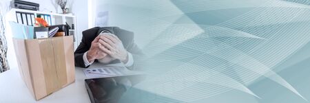 Concept of economic crisis; depressed fired employee; panoramic bannerの写真素材