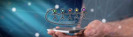 Teamwork concept above a smartphone held by a man
