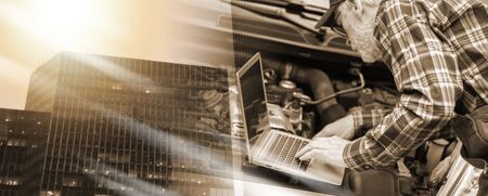 Car mechanic using laptop for checking car engine; multiple exposureの写真素材