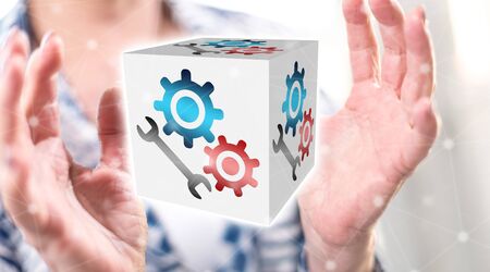 Maintenance system concept between hands of a woman in background