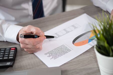 Businessman analyzing marketing data