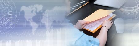 Businesswoman opening folder with paper documents; panoramic banner