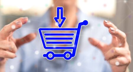 Shopping concept between hands of a woman in backgroundの写真素材