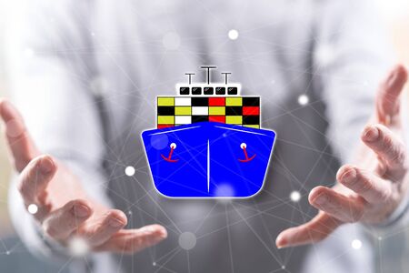 Maritime transportation concept above the hands of a man in background