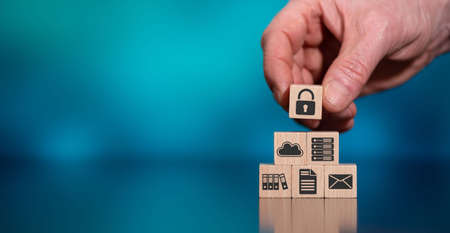 Concept of data protection with icons on wooden cubesの写真素材