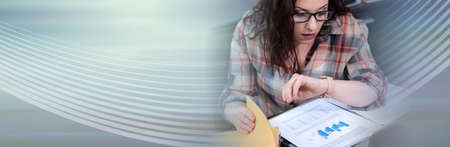 Stressed young businesswoman looking at her watch; panoramic banner