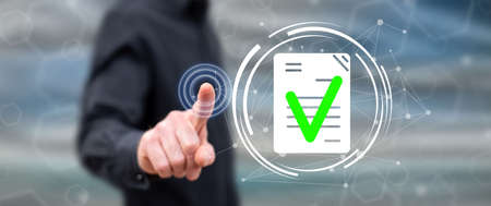 Man touching a document validation concept on a touch screen with his finger