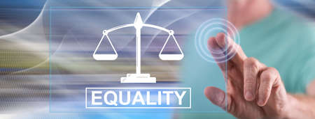 Man touching an equality concept on a touch screen with his finger