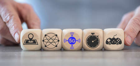 Concept of 5G with icons on wooden cubesの写真素材
