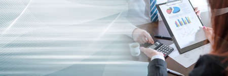 Business people working on a business plan; panoramic banner