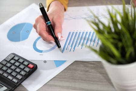 Businesswoman analyzing marketing data