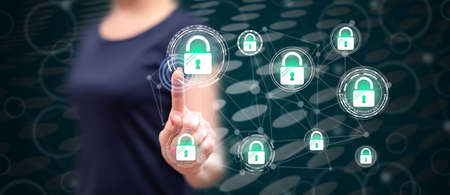 Woman touching a network safety concept on a touch screen with her finger