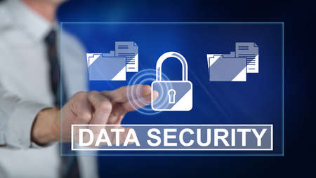 Man touching a data security concept on a touch screen with his finger