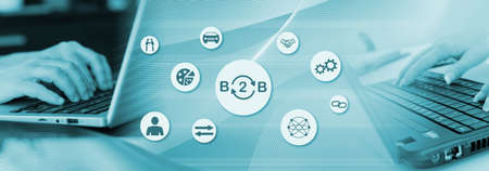 Concept of B2B with hands typing on laptop keyboard