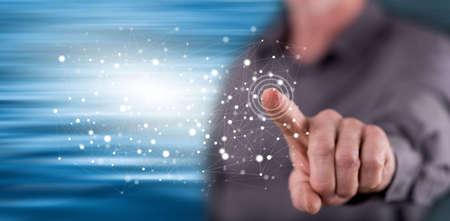 Man touching a network concept on a touch screen with his finger