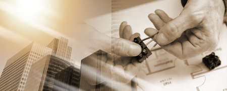 Electrician hands connecting wires in terminal block; multiple exposureの写真素材