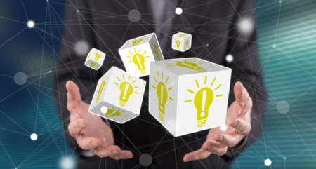 Idea concept above the hands of a man in background