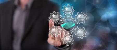 Man touching an e-learning concept on a touch screen with his finger